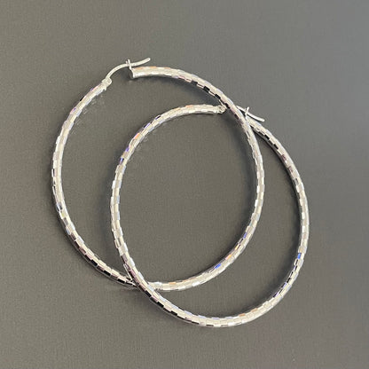 Hoop Earrings in Sterling Silver.