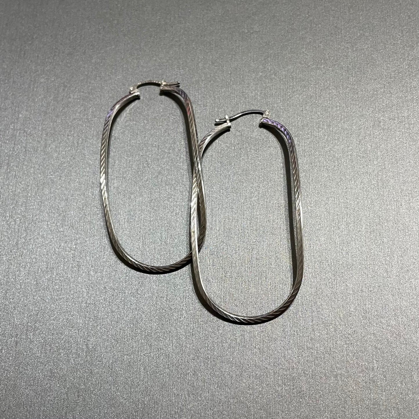 Hoop Twisted Earrings , Sterling Silver.